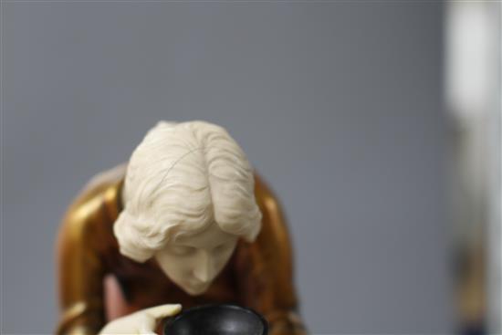 An Art Deco style resin figure of a lady, height 28cm